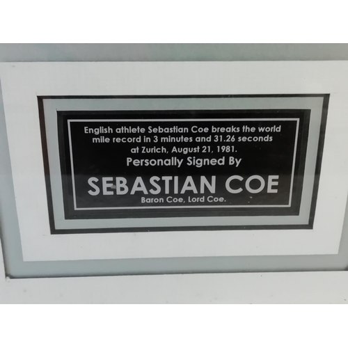 307 - Framed and Glazed Signed Picture of Sebastian Coe Breaking the World Mile Record in Zurich, 21st Aug... 