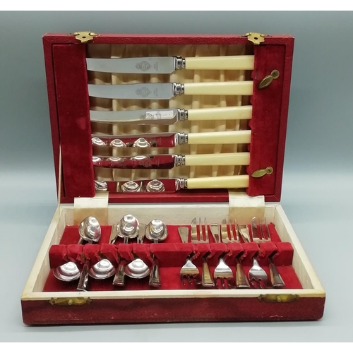 291 - John Turton 18 Piece Cutlery Set in Burgundy Case