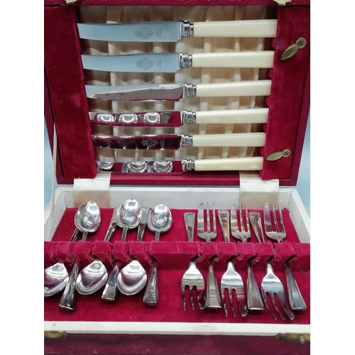 291 - John Turton 18 Piece Cutlery Set in Burgundy Case