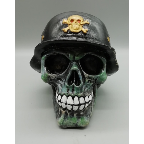 542 - Heavy Stone Skulls Head with German Helmet Ornament. 14cm high, 15cm long