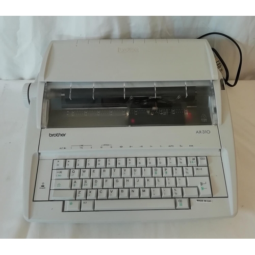 576 - Brother AX-310 Electric Typewriter. W/O. (Paper Feed needs Attention)