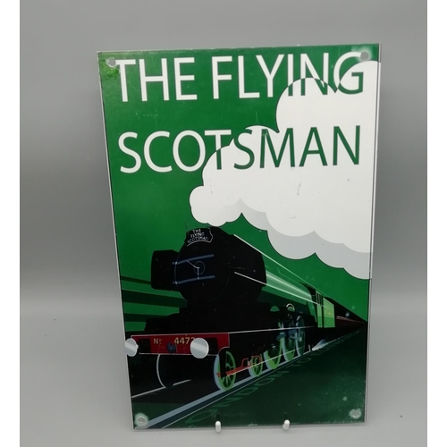 584 - 'The Flying Scotsman' Metal Sign. 30.5 cm High