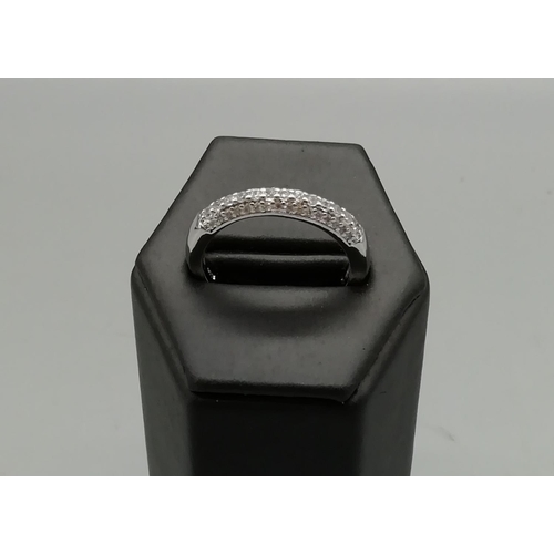 602 - Silver and CZ Ring. Marked 925