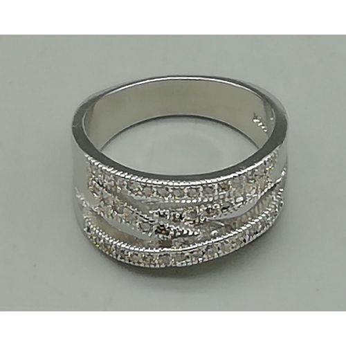 604 - Silver and CZ Ring. Marked 925
