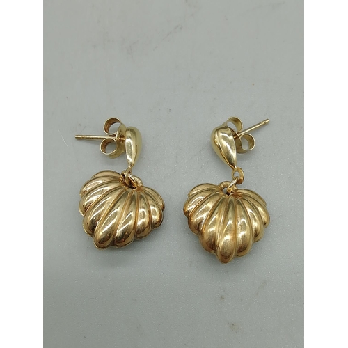 654 - 9ct Gold Shell Earrings. 1.19 Grams