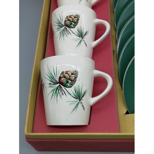 200A - Palissy 12 Piece Coffee Set in Box in the 'Sherwood' Pattern. (Chip to 1 Cup)