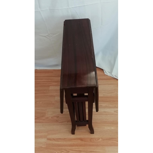 600 - Small Mahogany Drop Leaf Table with Brass Casters 72cm x 61cm x 81cm. This Lot is Collection Only