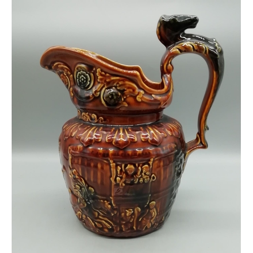 145 - Woods Ware Treacle Glaze Horses Head Jug. A/F - Repair to Inner Rim