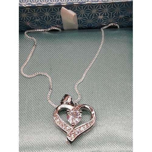 145A - Silver Heart Shaped Pendant with a Chain