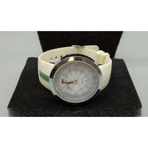 160B - Presented in the Style of a Large Faced Gucci Watch. W/O.