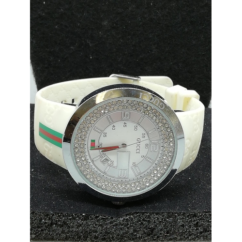 160B - Presented in the Style of a Large Faced Gucci Watch. W/O.