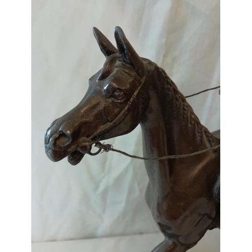 135 - Horse and Jockey Figure. Signed Charles Valton. 32cm High, 31cm Long A/F repair to the front and rea... 