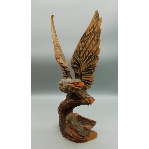 410 - Wooden Statue of an Eagle. 38cm High.