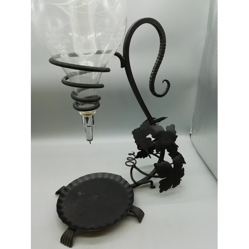 587 - Black Metal Leaf Pattern Wine Holder with Decanter and Cooler.