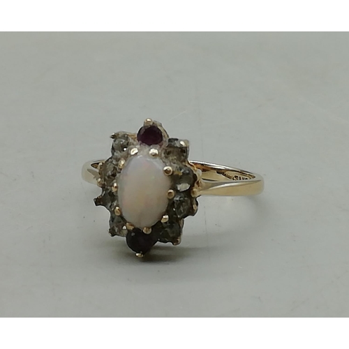 601 - 9ct Opal and Stones Ring. Size 17.