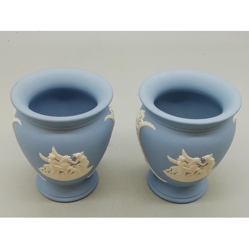 72 - Pair of Wedgwood Blue Jasper 10cm Urn Vases.