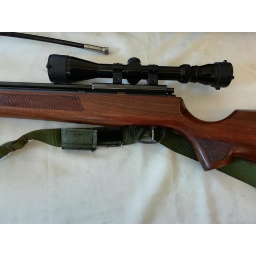 81 - 0.22 Cal Gas Powered Air Rifle with Scope and Webley Stirrup Pump. This Lot is Collection Only. Age ... 