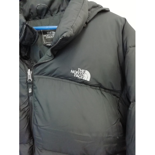 658 - Presented as XXL Northface Black Jacket.