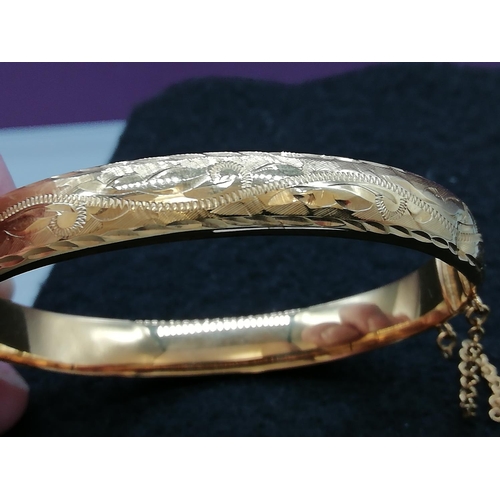 253 - 9ct Rolled Gold Bangle.