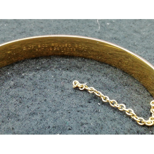 253 - 9ct Rolled Gold Bangle.