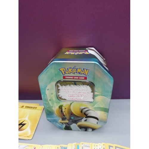 133 - Pokemon Tin with Cards.