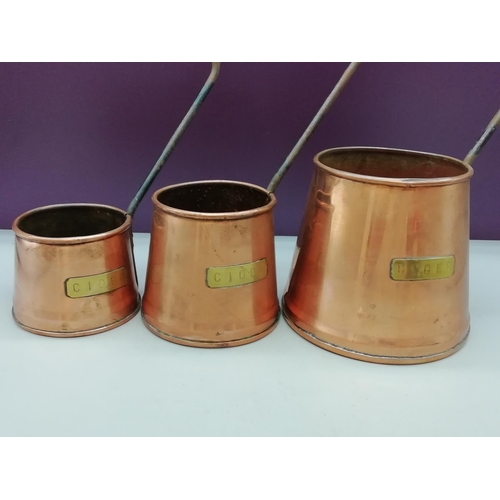 23 - Set of 3 Copper Cider Measures.