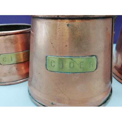 23 - Set of 3 Copper Cider Measures.