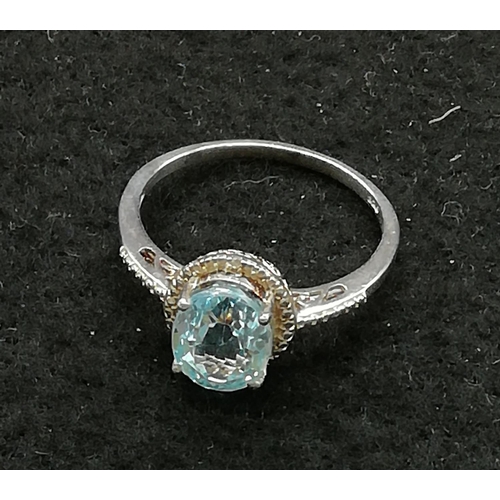 270 - Sterling Silver Ring set with Blue Topaz.