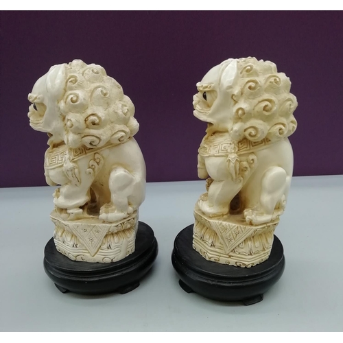 49 - Pair of Resin Foo Dogs on Stands. 15cm High.