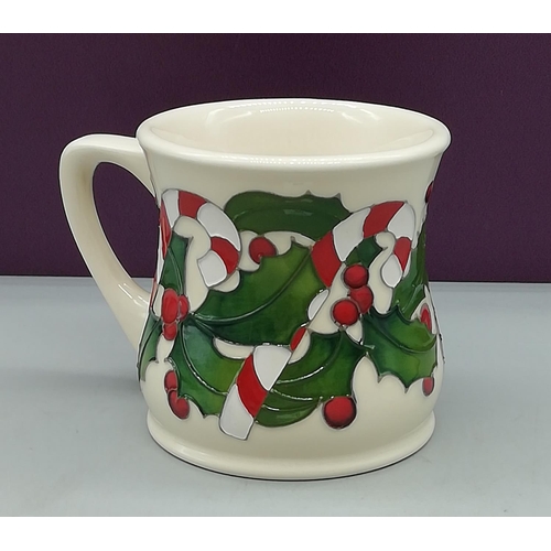 69 - Moorcroft Trail Mug in the 'Candy Cane' Design. 9cm High.