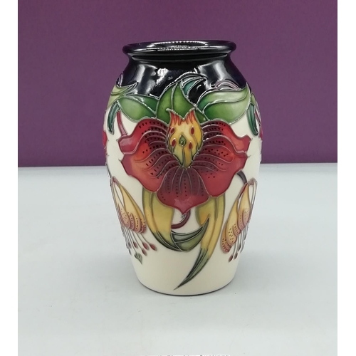 70 - Moorcroft 14cm Vase in the 'Anna Lily' Pattern designed by Nicola Slaney.