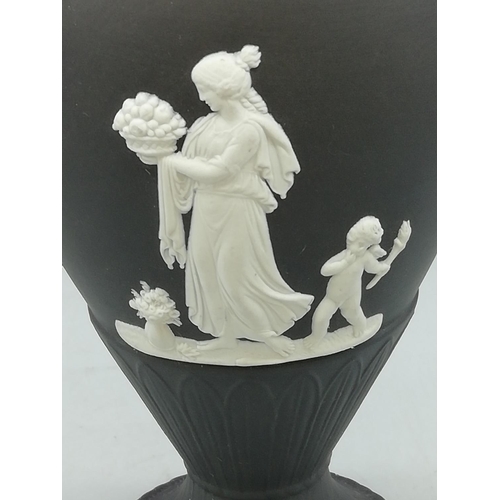 168 - Wedgwood Black Jasper Footed Vase. 18cm High.