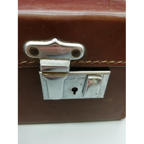 208 - English Leather Brown Suitcase with Key. 46cm x 28cm x 14cm. All proceeds from this Lot to Centrepoi... 