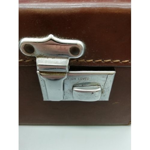 208 - English Leather Brown Suitcase with Key. 46cm x 28cm x 14cm. All proceeds from this Lot to Centrepoi... 