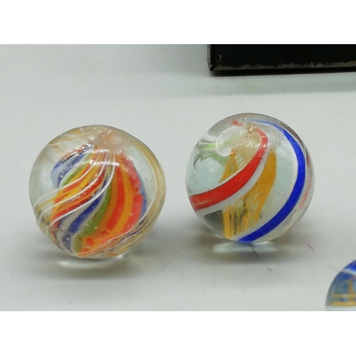 210 - Victorian Glass Multi Coloured Swirl Marbles (15) plus 4 Other Marbles in Tin. All proceeds from thi... 