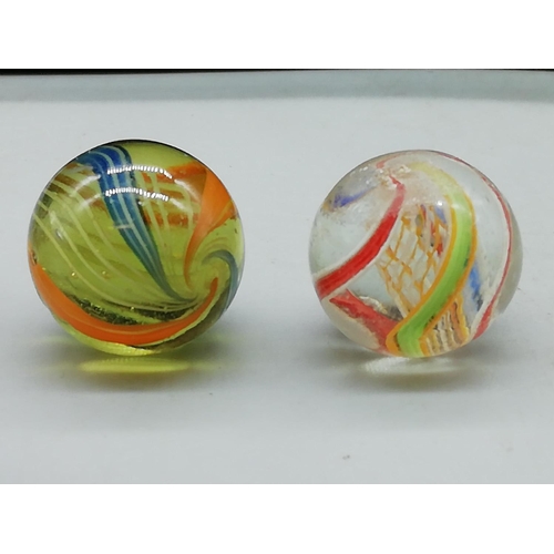 210 - Victorian Glass Multi Coloured Swirl Marbles (15) plus 4 Other Marbles in Tin. All proceeds from thi... 