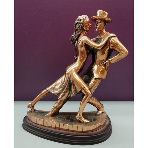 23 - Large Copper Finish Dancing Couple on Base. 31cm x 27cm.