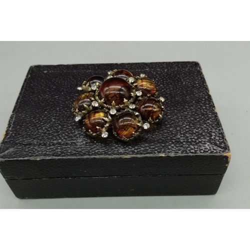 256 - Christian Dior by Mitchel Maer Brooch with Marbled Amber Coloured Claw Set Cabuchon Stones. All proc... 