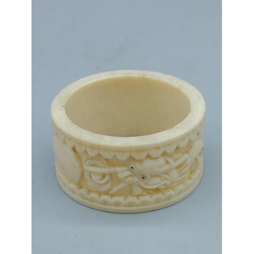 259 - Miniature Bone Ivory Buddha plus Carved Ivory Napkin Ring. All proceeds from this Lot to Centrepoint... 