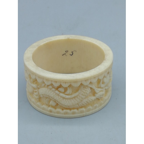 259 - Miniature Bone Ivory Buddha plus Carved Ivory Napkin Ring. All proceeds from this Lot to Centrepoint... 