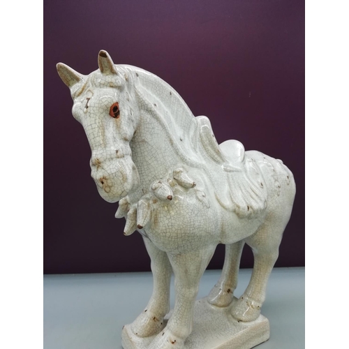 285 - Large Ceramic Figure of a Horse on a Plinth. 32cm High.