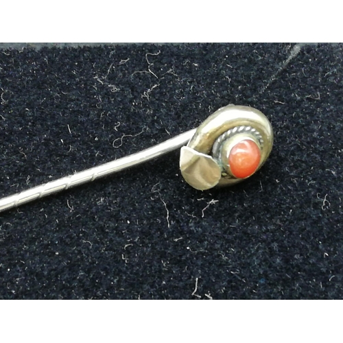 473 - Yellow Metal and Coral Stone Pin Brooch.