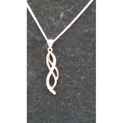 572 - 925 Silver Necklace with Diamond Set Pendant.