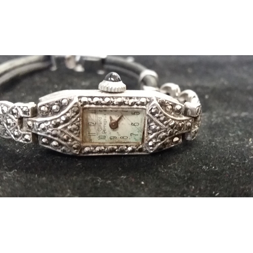 597 - Girard Silver and Marcasite Ladies Watch.