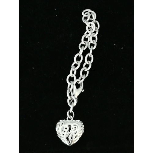 650 - 925 Silver Bracelet with Filigree Heart.