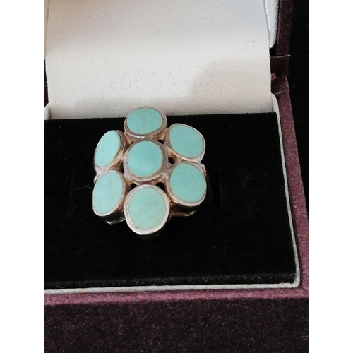 653 - 925 Silver Ring with Turquoise Decoration. bottom stone reglued.