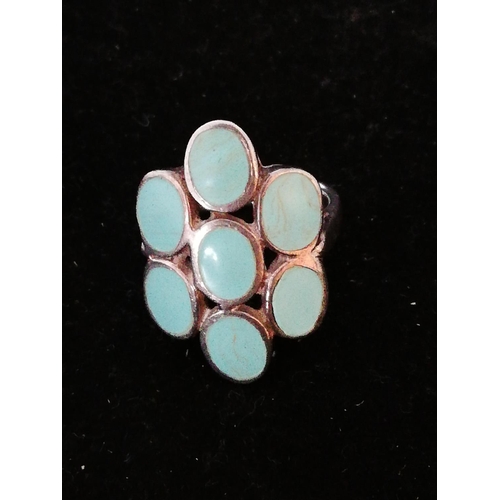 653 - 925 Silver Ring with Turquoise Decoration. bottom stone reglued.