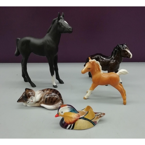 685 - Beswick and Royal Doulton Foals (3) plus Royal Doulton Cat and Beswick Duck.