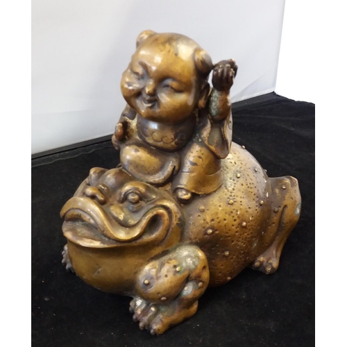 735 - Bronze ? Buddha on Frog. 18cm High, 18cm Long.