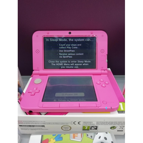 12 - Nintendo 3 DS XL plus 9 Games. Please note - Frozen Game is inside the Animal Crossing Box.